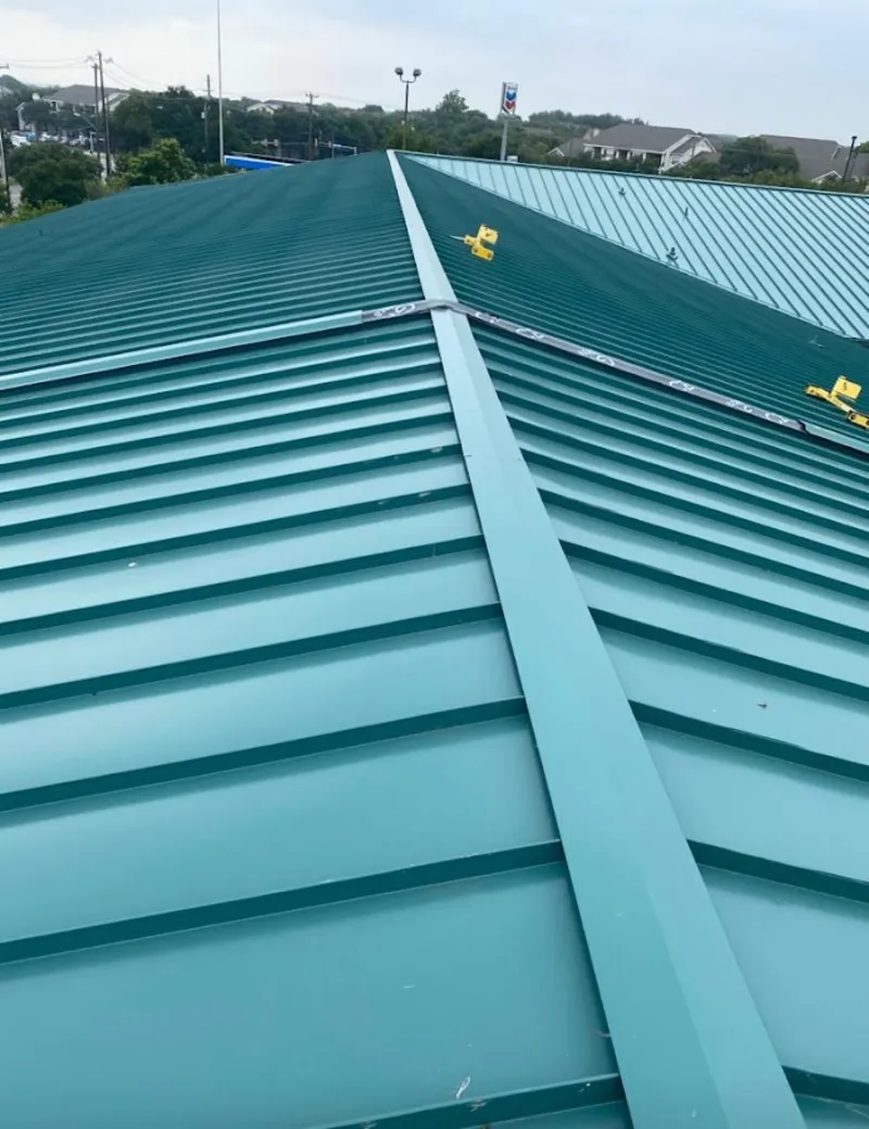 Green commercial metal roof ridge and valley for Metal Roof Repair in Willowbrook